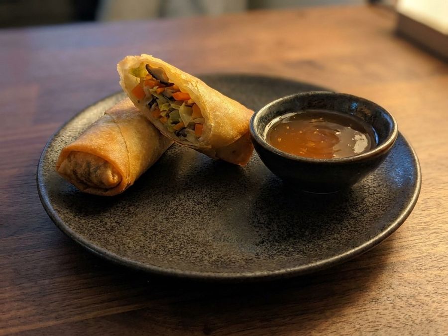 Spring Rolls: Two crisp vegetable rolls, sweet dipping sauce